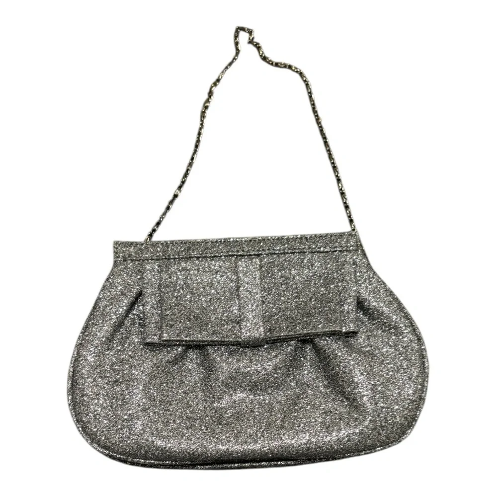 Miss KG Clutch with Chain Strap and a Bow Accent on the Front Silver